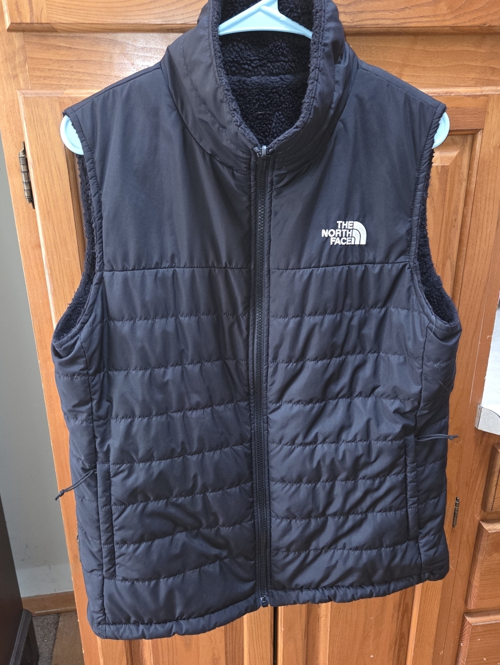 Women's size Large reversible The North Face vest